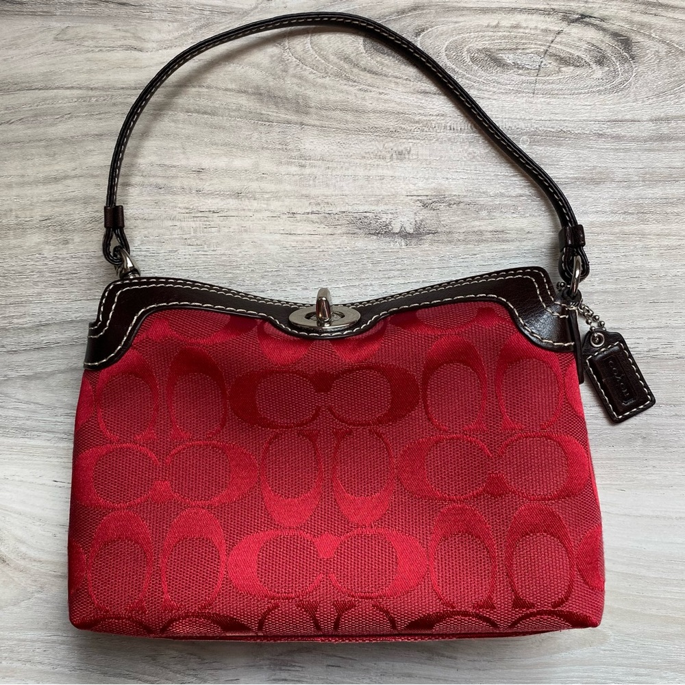 Coach red signature wristlet with clasp closure